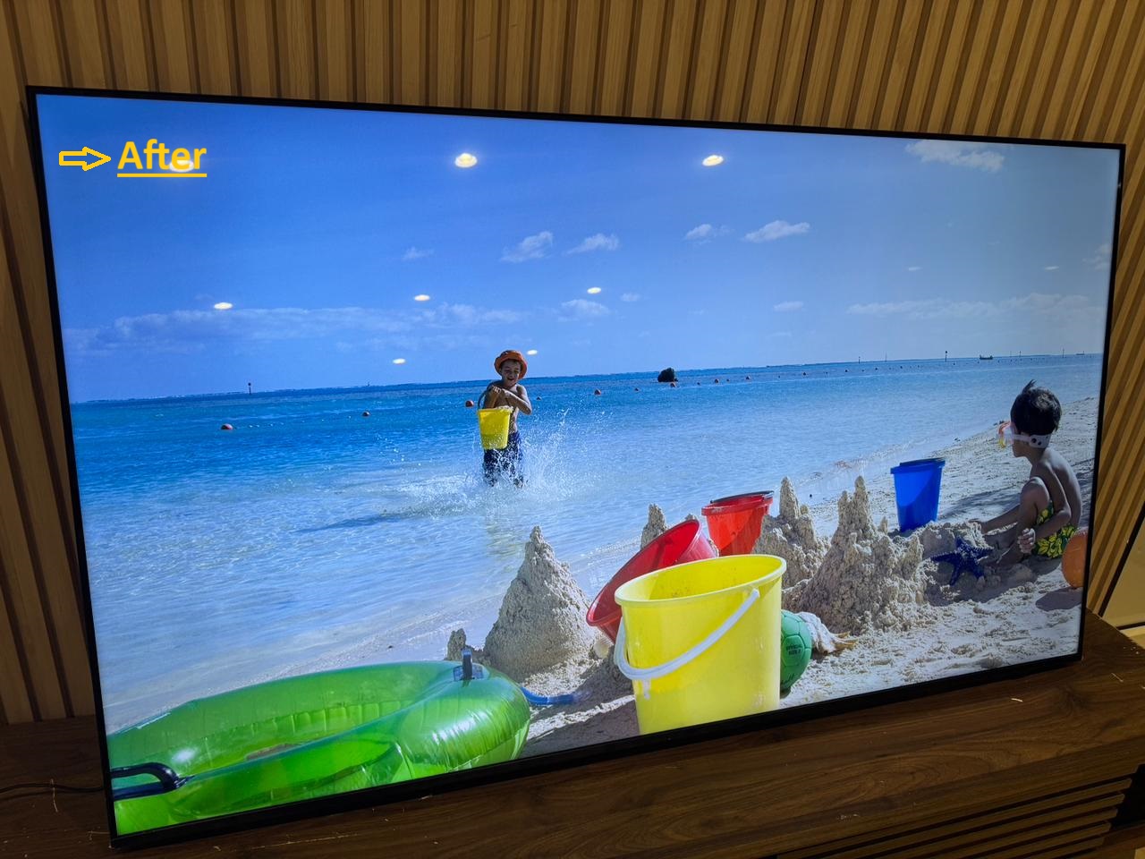 LG 55 inch TV powered on and working after repair
