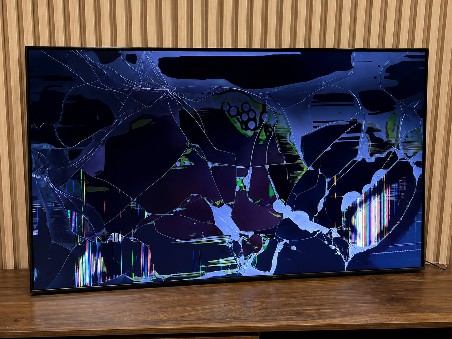 Samsung 65 inch TV showing vertical lines before repair